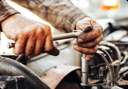 EasyClocking biometric time clock mounted in an industrial environment for hands-on industries